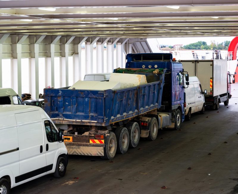 trucks-minibuses-located-inside-ferryboat-greece-scaled.jpg